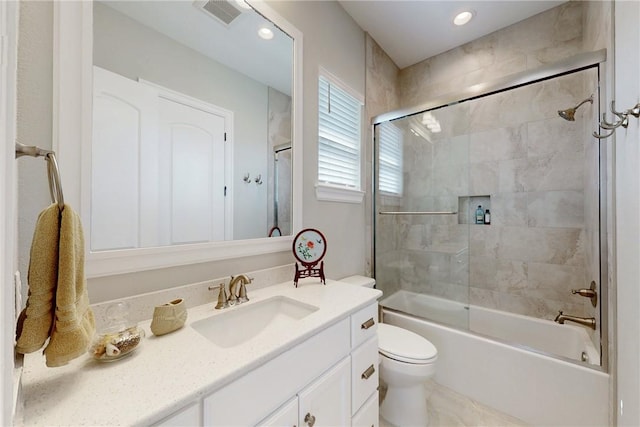 bathroom with shower / tub combination, toilet, recessed lighting, visible vents, and vanity