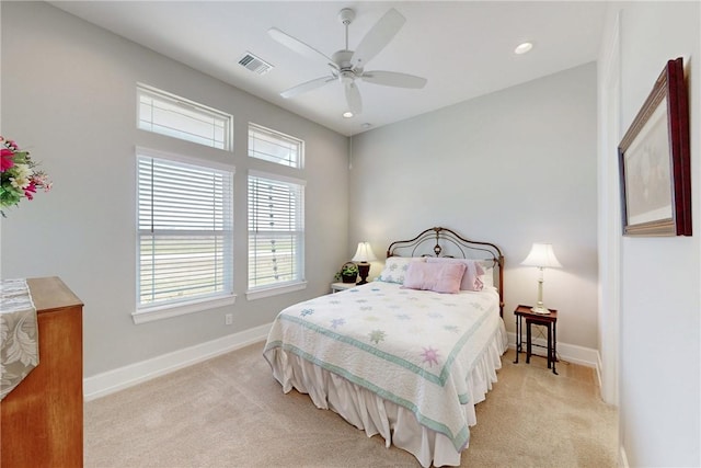 bedroom featuring light carpet, baseboards, visible vents, and recessed lighting