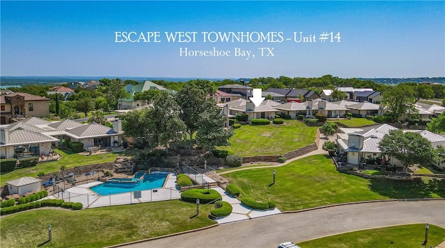 1406 Broken Hls Unit 14, Horseshoe Bay, TX 78657 - aerial view of residential area featuring a pool area