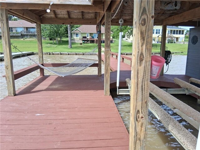 231 Memphis Belle Ln, Trinity, TX 75862 - dock area featuring a yard and a water view