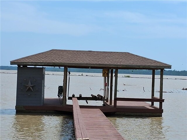 231 Memphis Belle Ln, Trinity, TX 75862 - dock with boat lift and a water view