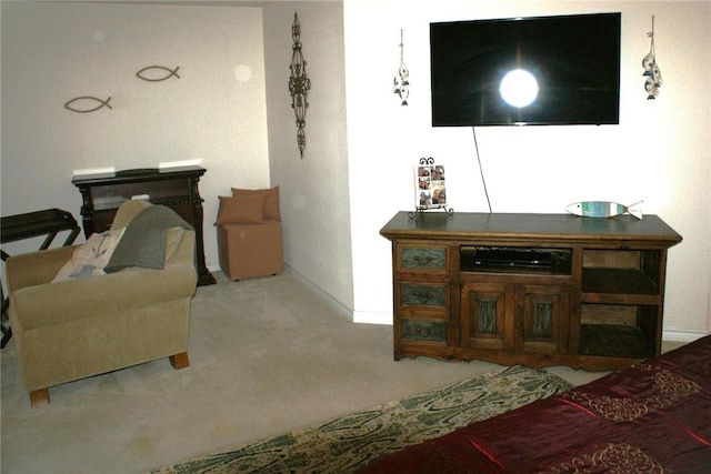 231 Memphis Belle Ln, Trinity, TX 75862 - carpeted living area featuring baseboards