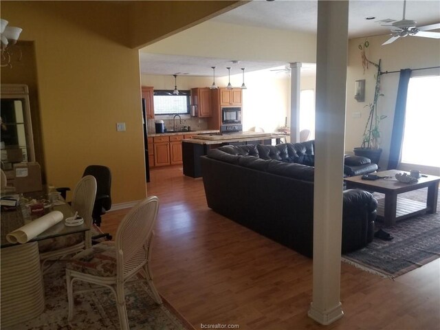 231 Memphis Belle Ln, Trinity, TX 75862 - living room with wood finished floors and ceiling fan