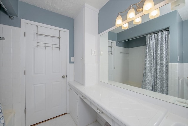 bathroom with a textured ceiling