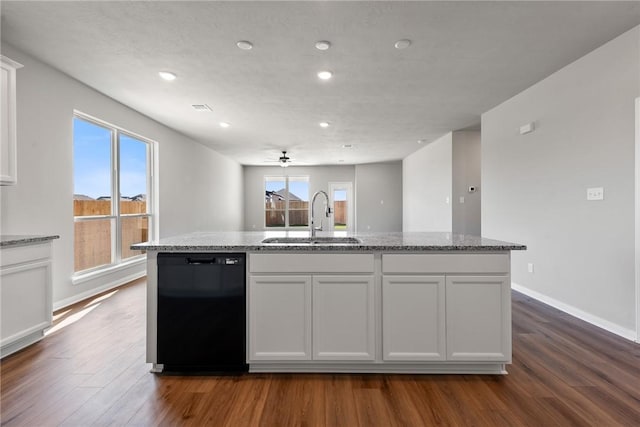 kitchen with dishwasher, white cabinetry, plenty of natural light, and sink