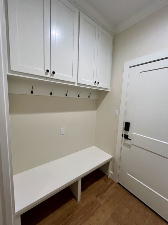 2016 R A Galindo Blvd, Bryan, TX 77807 - mudroom with wood finished floors and ornamental molding