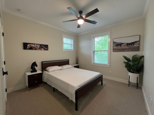 2016 R A Galindo Blvd, Bryan, TX 77807 - bedroom with ornamental molding, light carpet, baseboards, and a ceiling fan
