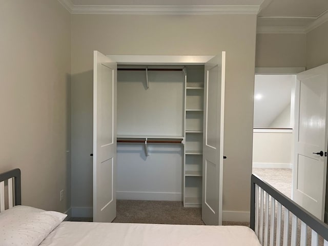 2016 R A Galindo Blvd, Bryan, TX 77807 - unfurnished bedroom featuring ornamental molding, carpet, baseboards, and a closet