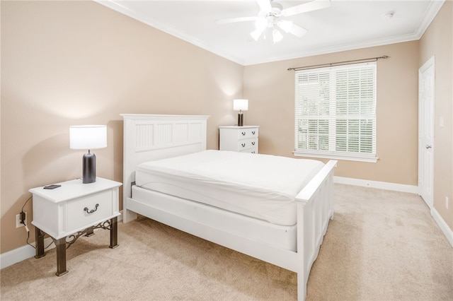bedroom featuring a ceiling fan, baseboards, light colored carpet, and ornamental molding