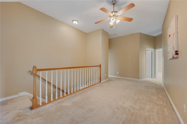 1605 Dominik Dr, College Station, TX 77840 - empty room with carpet, a ceiling fan, and baseboards