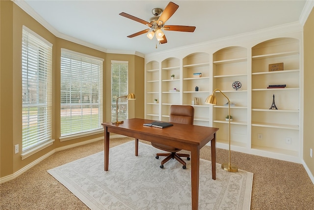 1605 Dominik Dr, College Station, TX 77840 - carpeted home office featuring plenty of natural light, ceiling fan, built in shelves, baseboards, and crown molding