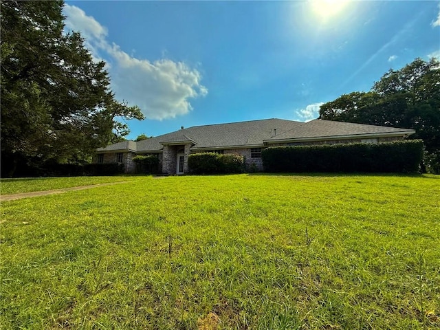 40 Casper Pl, Hilltop Lakes, TX 77871 - view of front of property with a front lawn