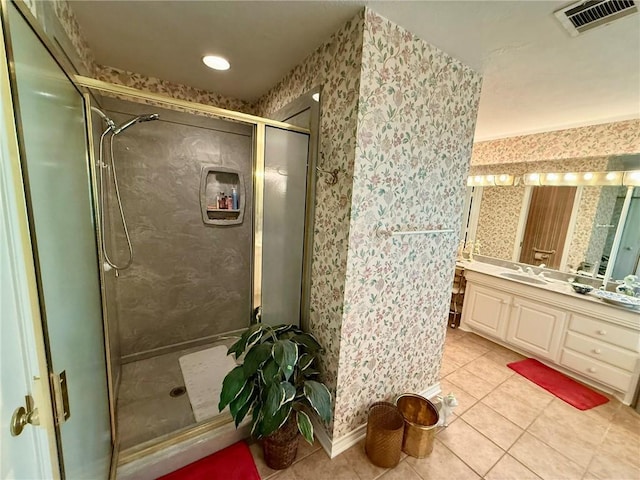 40 Casper Pl, Hilltop Lakes, TX 77871 - bathroom with wallpapered walls, a shower stall, tile patterned flooring, and vanity
