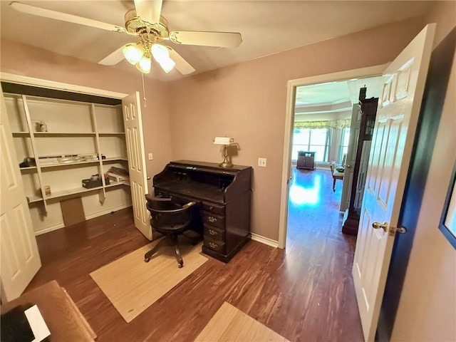 40 Casper Pl, Hilltop Lakes, TX 77871 - office area featuring wood finished floors, ceiling fan, and baseboards