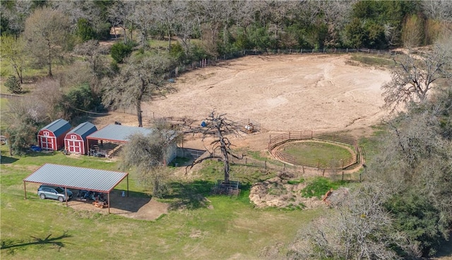 birds eye view of property featuring a rural view