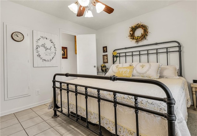 bedroom featuring light tile patterned floors and ceiling fan