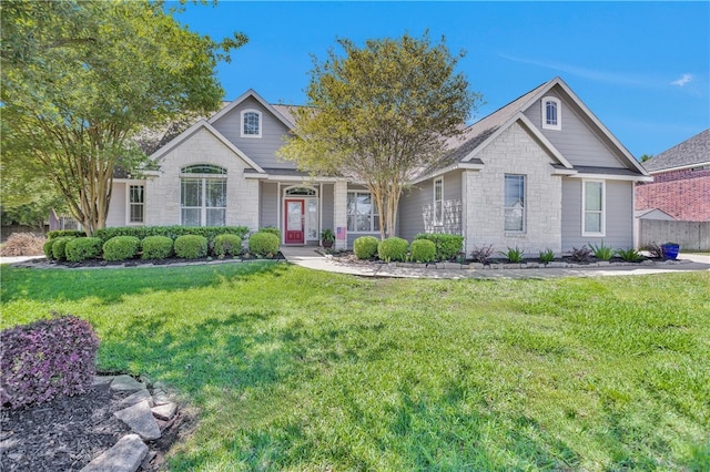 291 Berkley Dr, Montgomery, TX 77356 - view of front facade featuring stone siding and a porch