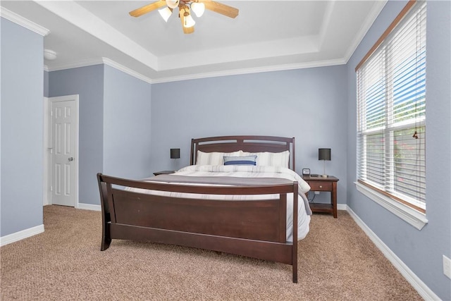 291 Berkley Dr, Montgomery, TX 77356 - bedroom with a raised ceiling, light colored carpet, a ceiling fan, and ornamental molding