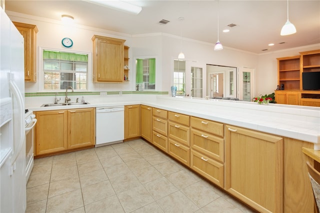 kitchen with white appliances, ornamental molding, pendant lighting, open shelves, and a sink