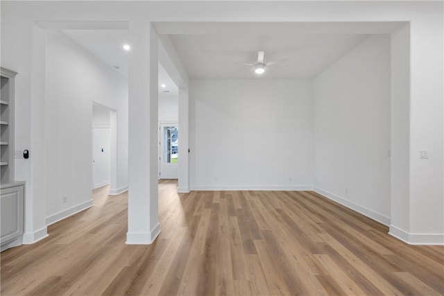 spare room with ceiling fan and light hardwood / wood-style floors