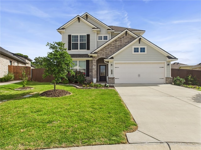 3903 Brownway Ct, College Station, TX 77845 - view of front facade with brick siding, a garage, and driveway