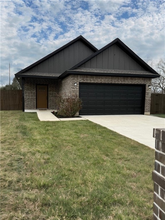 ranch-style house with a garage and a front lawn