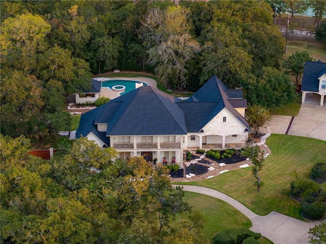 aerial view with a wooded view