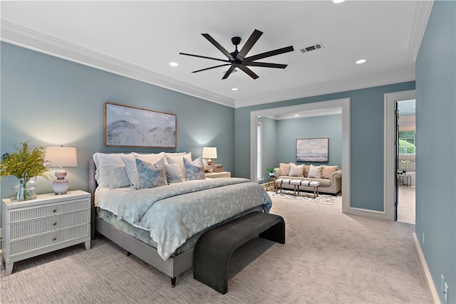 carpeted bedroom featuring recessed lighting, baseboards, ornamental molding, and a ceiling fan