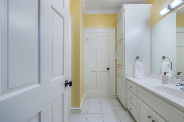 bathroom with vanity, tile patterned floors, and ornamental molding