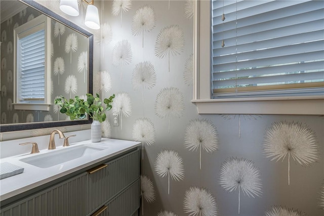 bathroom with vanity and plenty of natural light