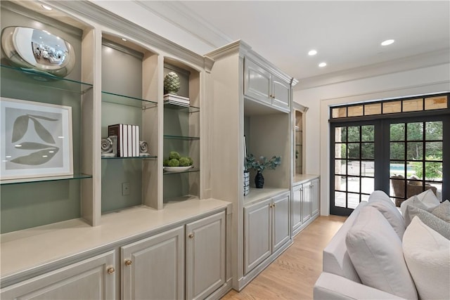 interior space featuring light wood-style floors, recessed lighting, and built in features