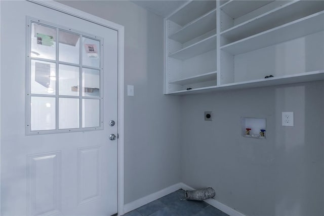 laundry area with hookup for an electric dryer, washer hookup, tile patterned flooring, and a healthy amount of sunlight