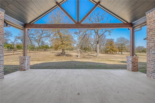 view of patio / terrace with a rural view