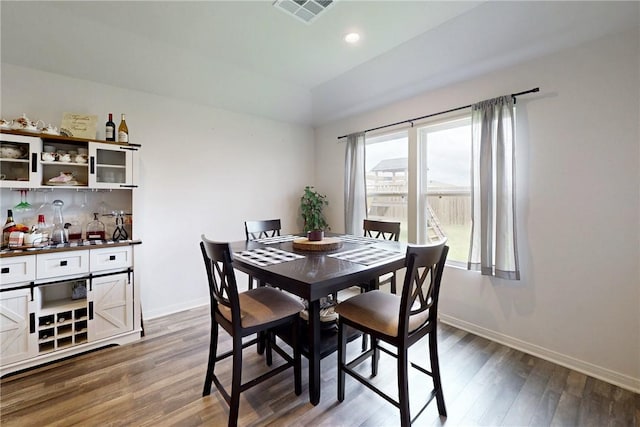 137 Windmill Rd, Snook, TX 77878 - dining space featuring wood finished floors, lofted ceiling, and recessed lighting
