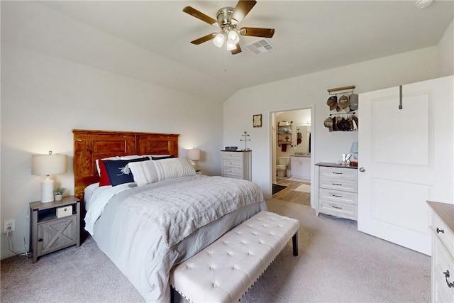 137 Windmill Rd, Snook, TX 77878 - bedroom featuring light carpet, vaulted ceiling, ensuite bathroom, and ceiling fan
