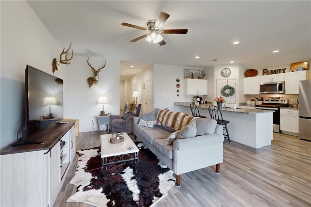 137 Windmill Rd, Snook, TX 77878 - living area featuring ceiling fan, light wood-style flooring, and recessed lighting