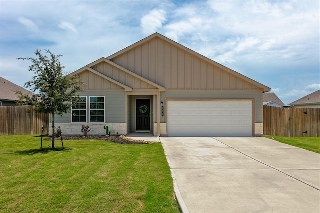 137 Windmill Rd, Snook, TX 77878 - view of front of home featuring stone siding, an attached garage, concrete driveway, and board and batten siding