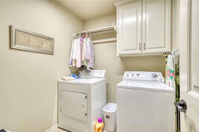 2703 Wood Ct, Bryan, TX 77808 - laundry area with washing machine and dryer and cabinet space