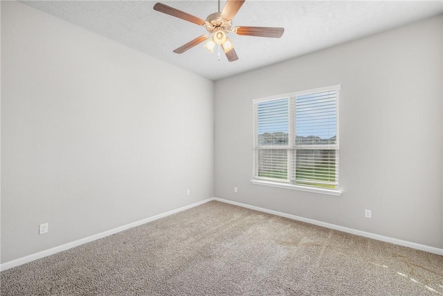 2099 Positano Loop, Bryan, TX 77808 - empty room featuring carpet, baseboards, and ceiling fan