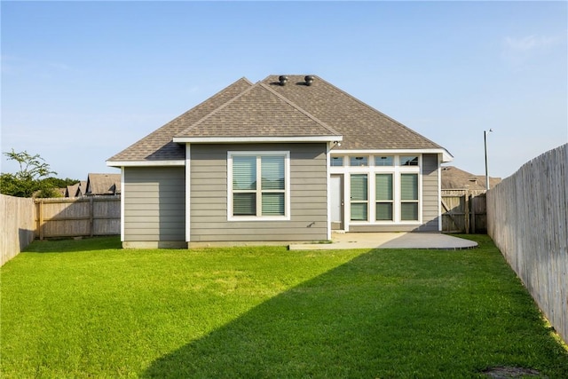 2099 Positano Loop, Bryan, TX 77808 - back of house featuring roof with shingles and a patio