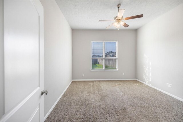 2099 Positano Loop, Bryan, TX 77808 - spare room featuring a ceiling fan, carpet, baseboards, and a textured ceiling