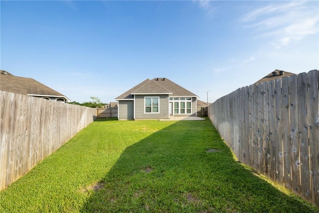 2099 Positano Loop, Bryan, TX 77808 - back of house with a shingled roof