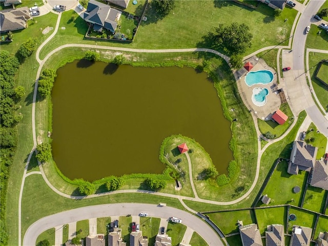 2099 Positano Loop, Bryan, TX 77808 - bird's eye view of a nearby body of water and a pool area