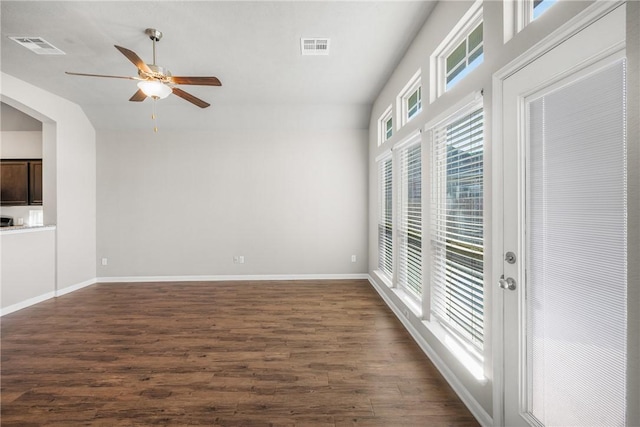 2099 Positano Loop, Bryan, TX 77808 - empty room with a ceiling fan, dark wood-type flooring, baseboards, and lofted ceiling