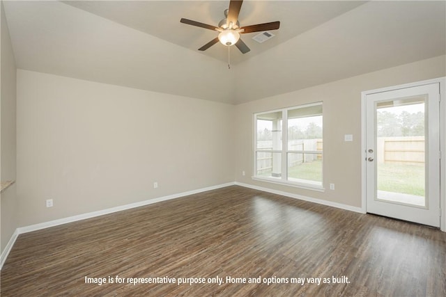 301 Whaley St, Caldwell, TX 77836 - empty room featuring dark wood finished floors, baseboards, a ceiling fan, and vaulted ceiling