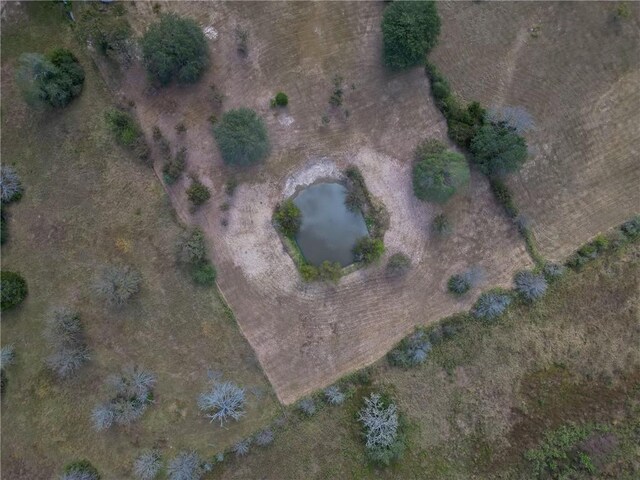 aerial view with a water view and a rural view