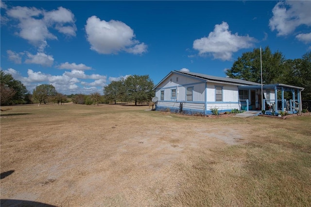 view of front of property with a front yard