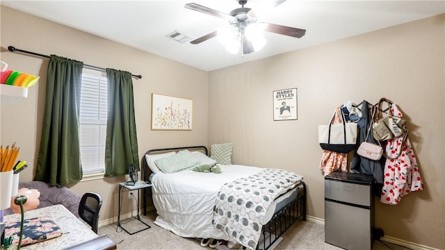 bedroom featuring visible vents, ceiling fan, and baseboards