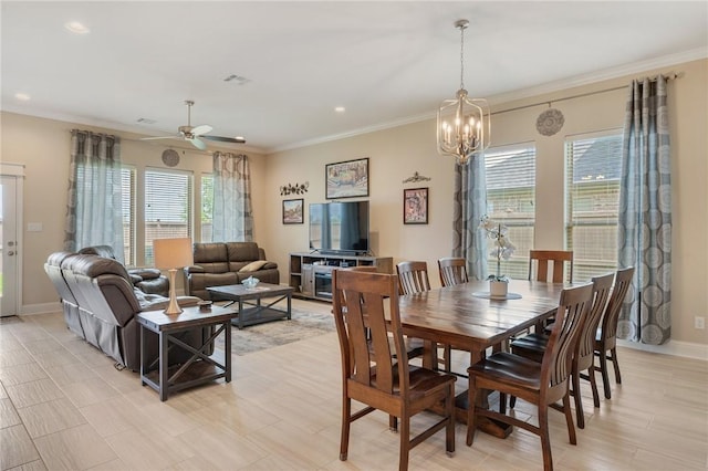 dining room with crown molding, ceiling fan with notable chandelier, recessed lighting, and visible vents