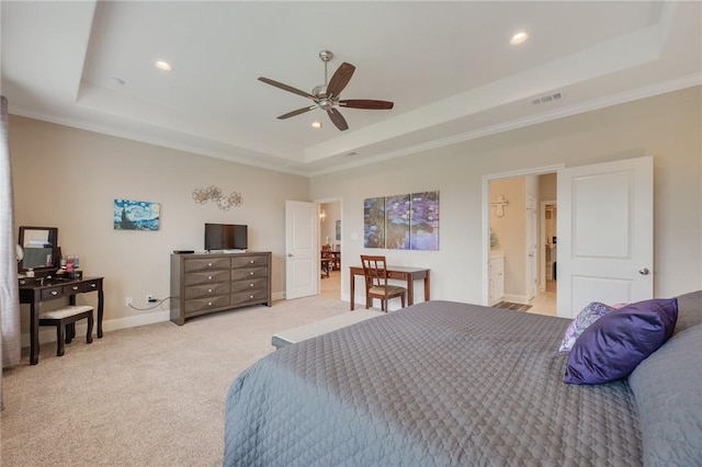 bedroom with light carpet, recessed lighting, baseboards, a tray ceiling, and visible vents